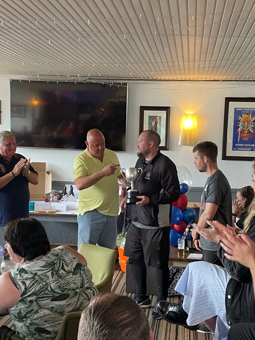 Weysiders 5, Kingsfield 0: Charity Match in aid of Williams Syndrome. Phil Ney receives the trophy.